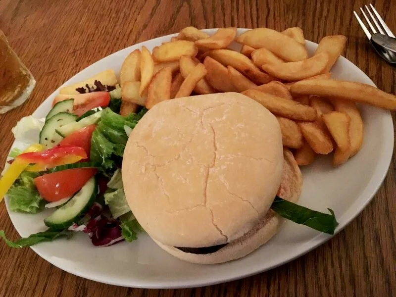 Mushroom burger with chips and salad